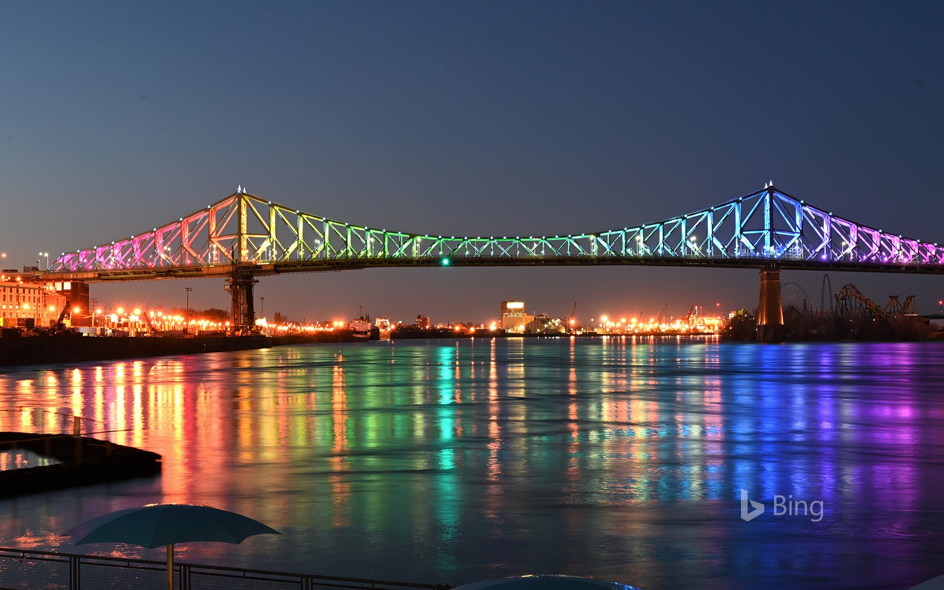 The Jacques Cartier bridge in Montreal is illuminated in the colours of the rainbow as a sign of hope and in support of the victims of the coronavirus