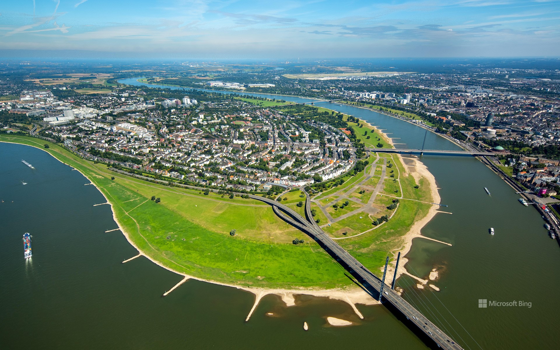 Aerial view of the Oberkassel district of Düsseldorf with the Rheinknie Bridge and the Oberkasseler Bridge, North Rhine-Westphalia