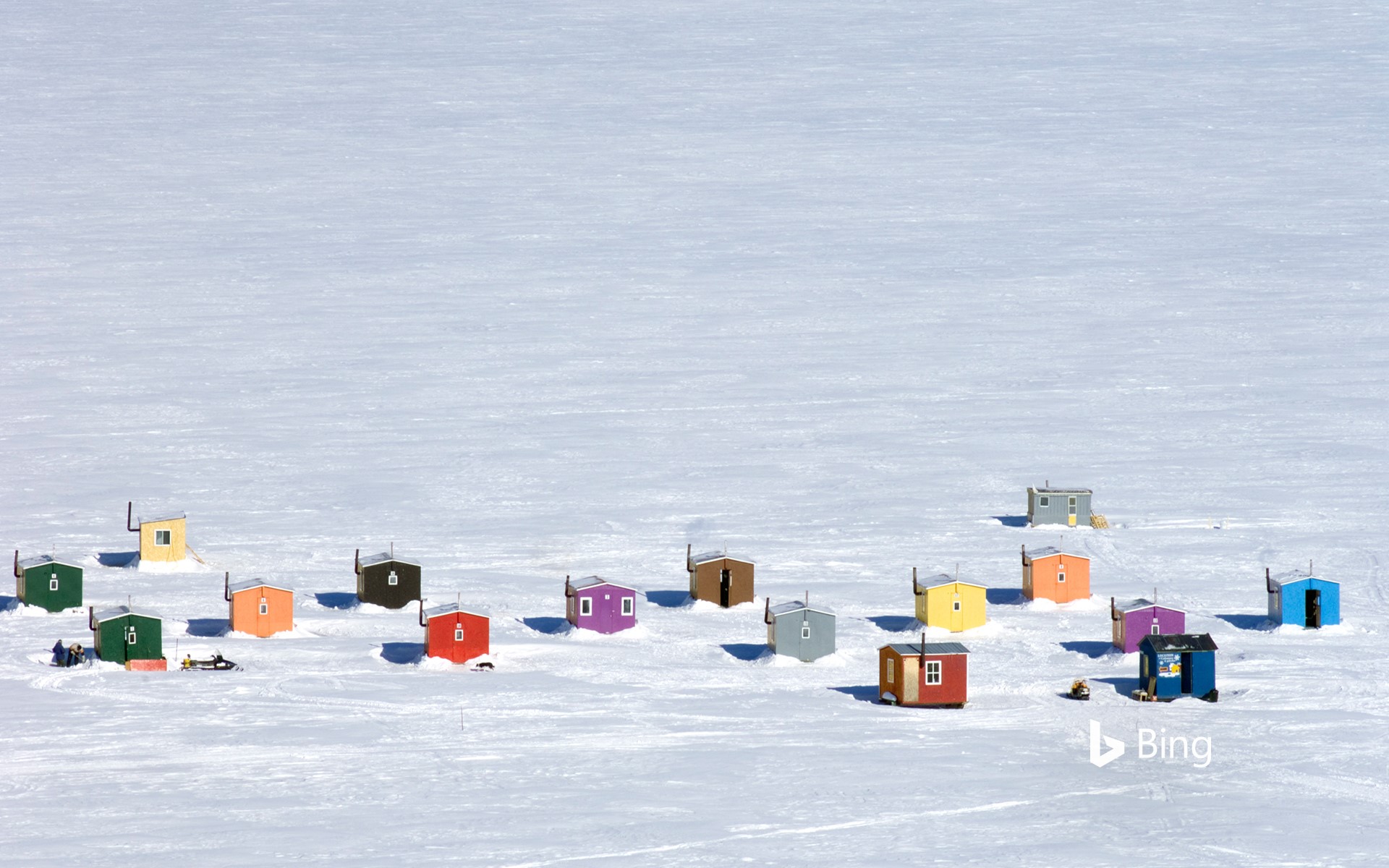 Ice fishing huts in L'Anse-St-Jean, Quebec, Canada