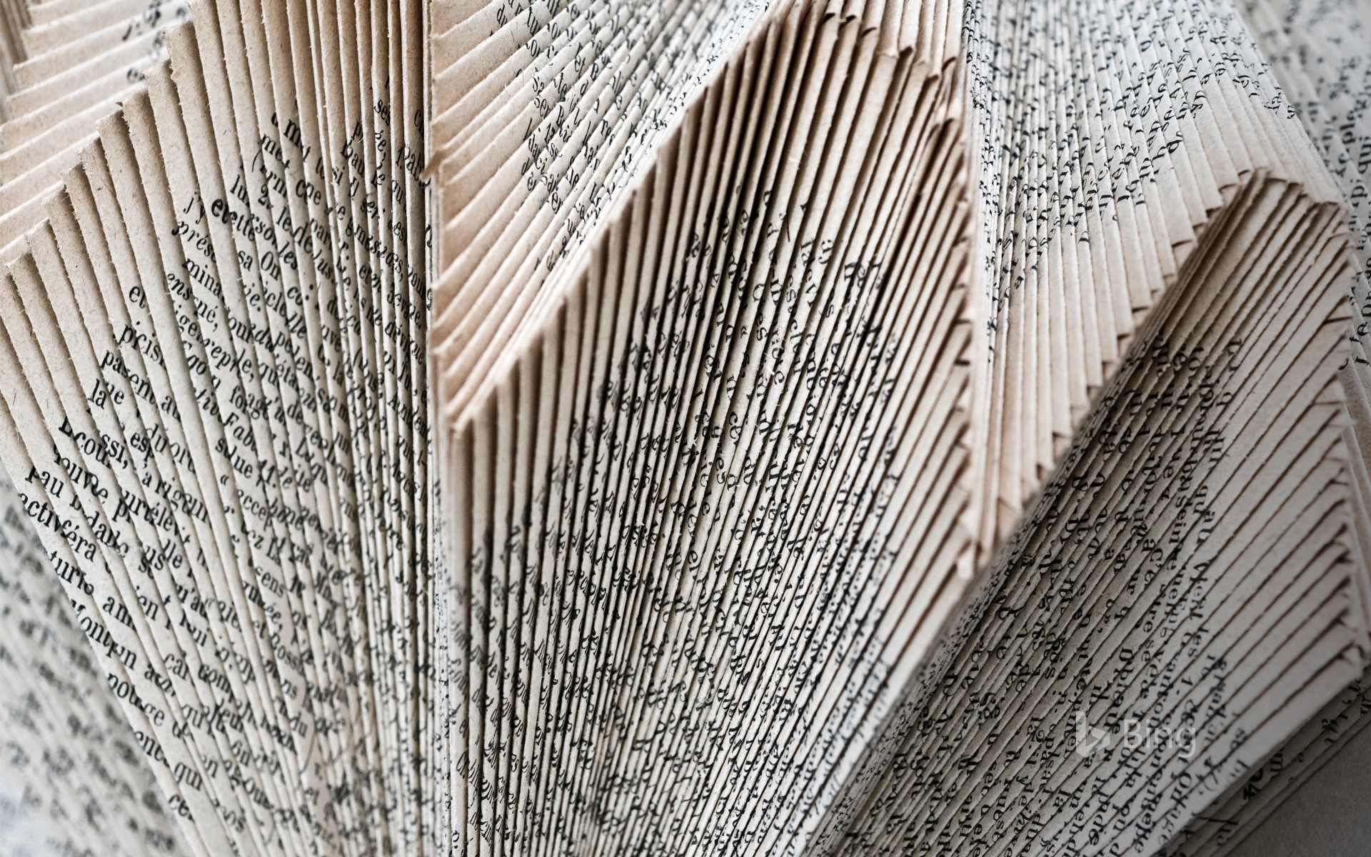 Decorative structure of folded book pages, Angles-sur-l'Anglin, Vienne