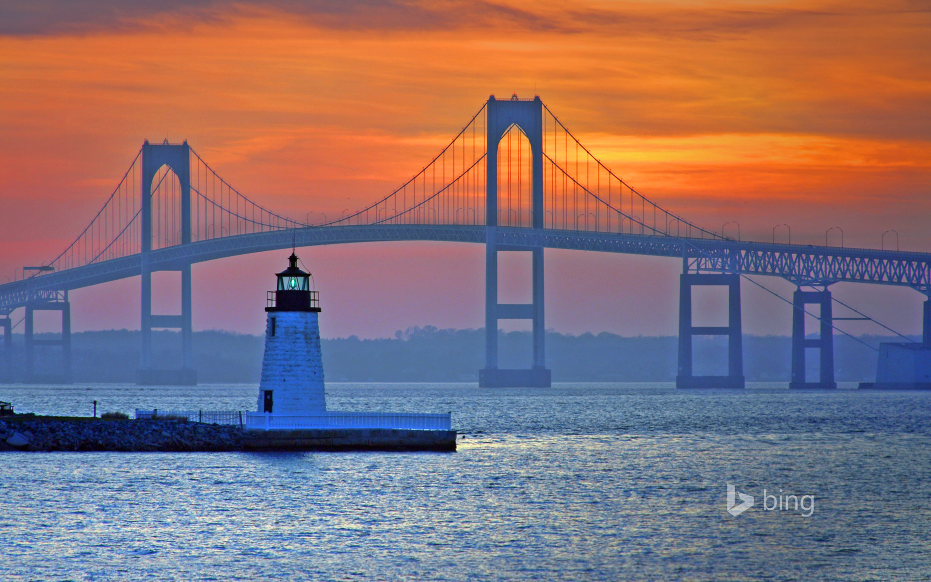 Claiborne Pell Newport Bridge and Newport Harbor Light in Newport, Rhode Island