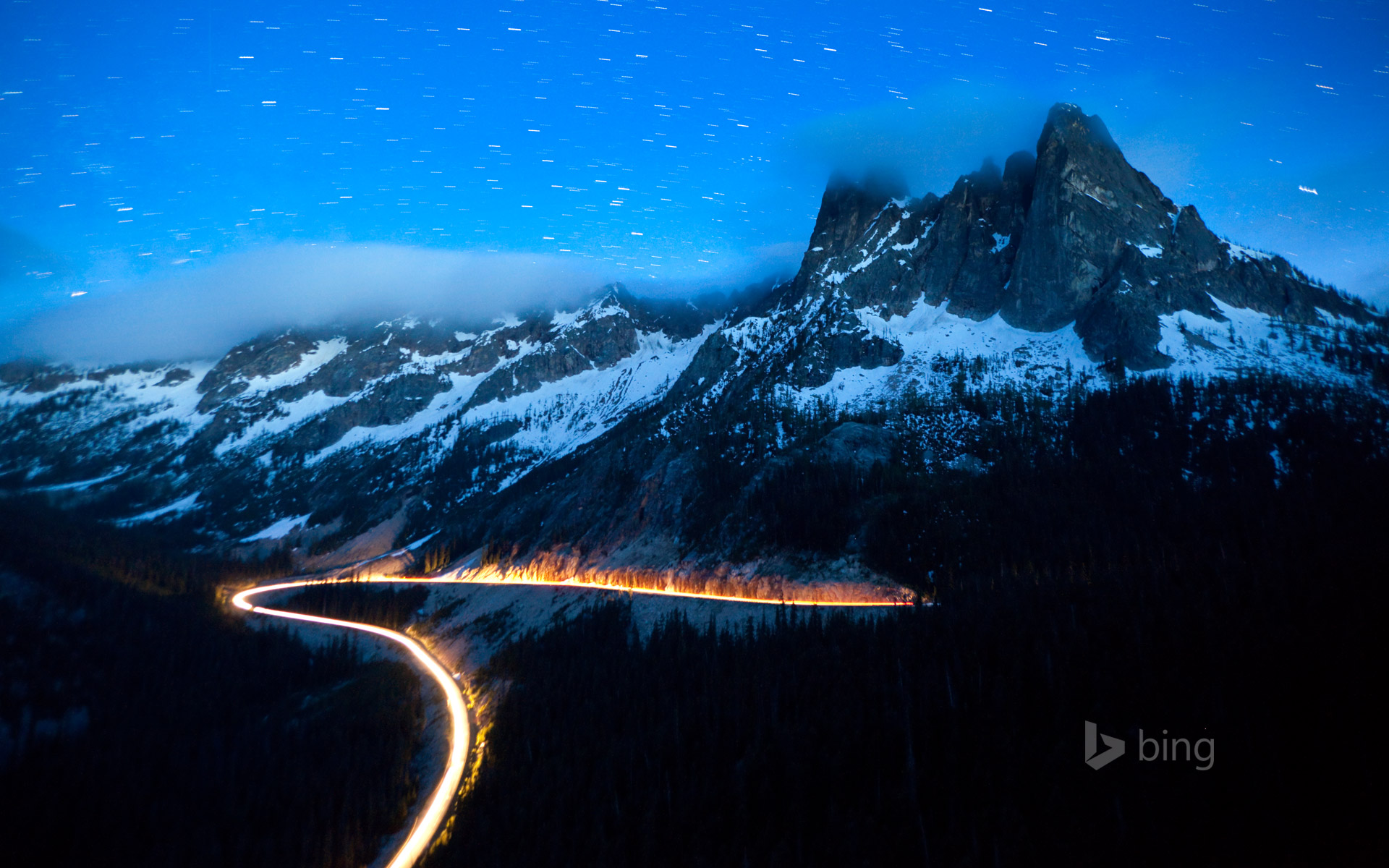 Headlights on State Route 20, the North Cascades Scenic Highway, Washington