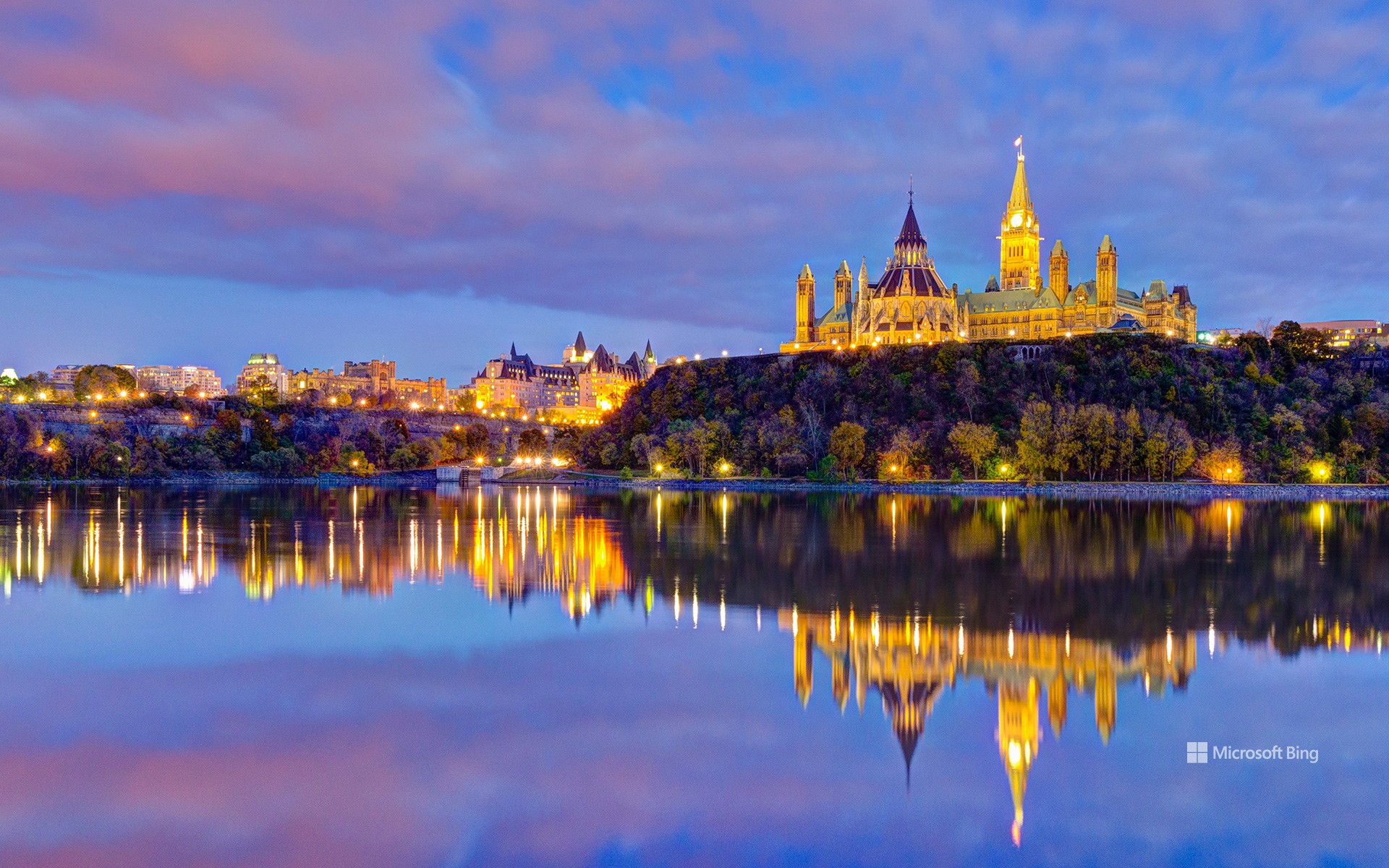 The Parliament buildings across the Ottawa River in Ottawa