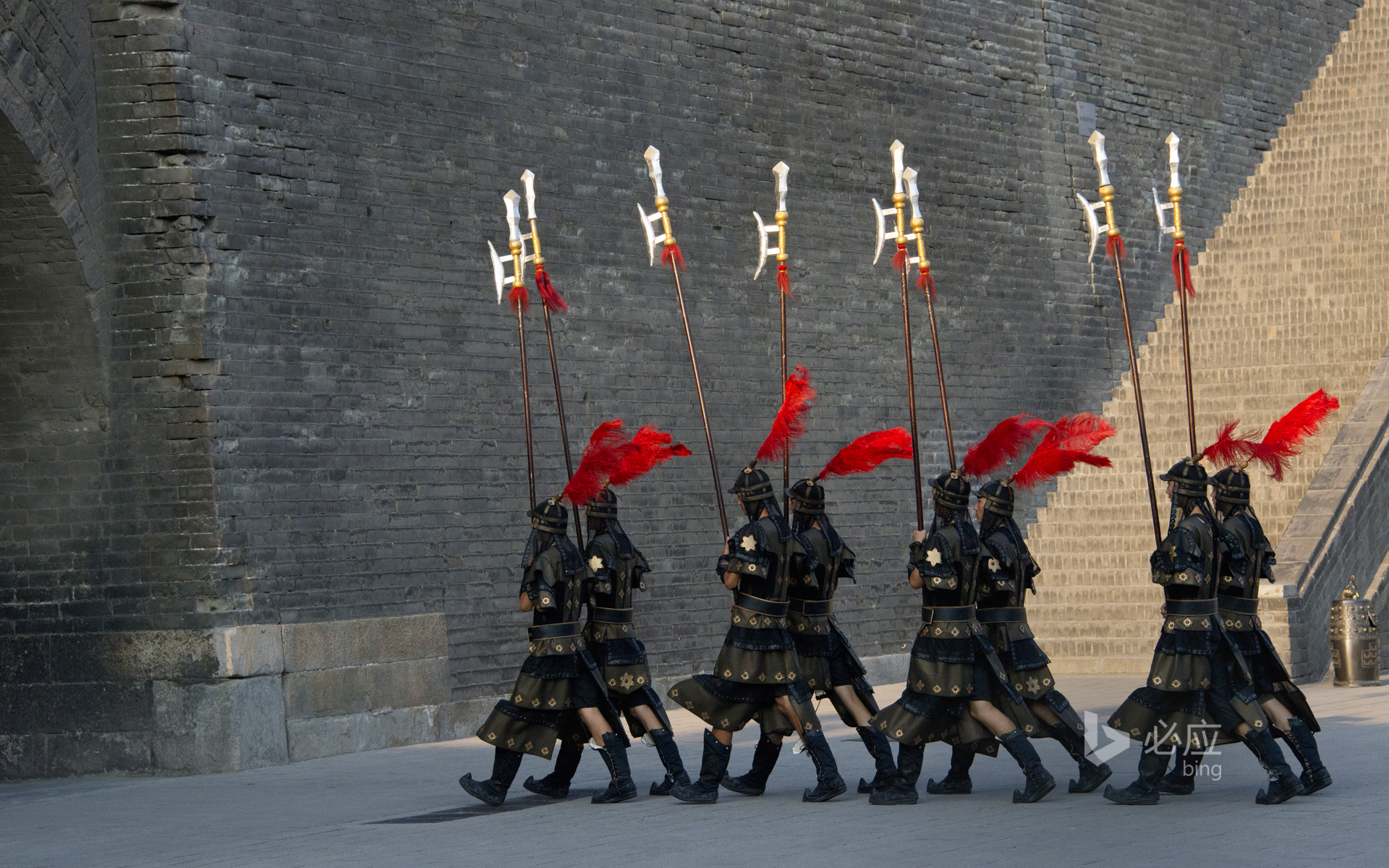 Soldiers wearing Qin costumes at the ancient city wall of Xi'an, Shaanxi