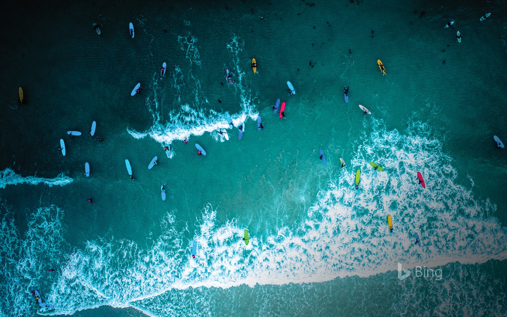 Aerial view of surfers in Cornwall for International Surfing Day