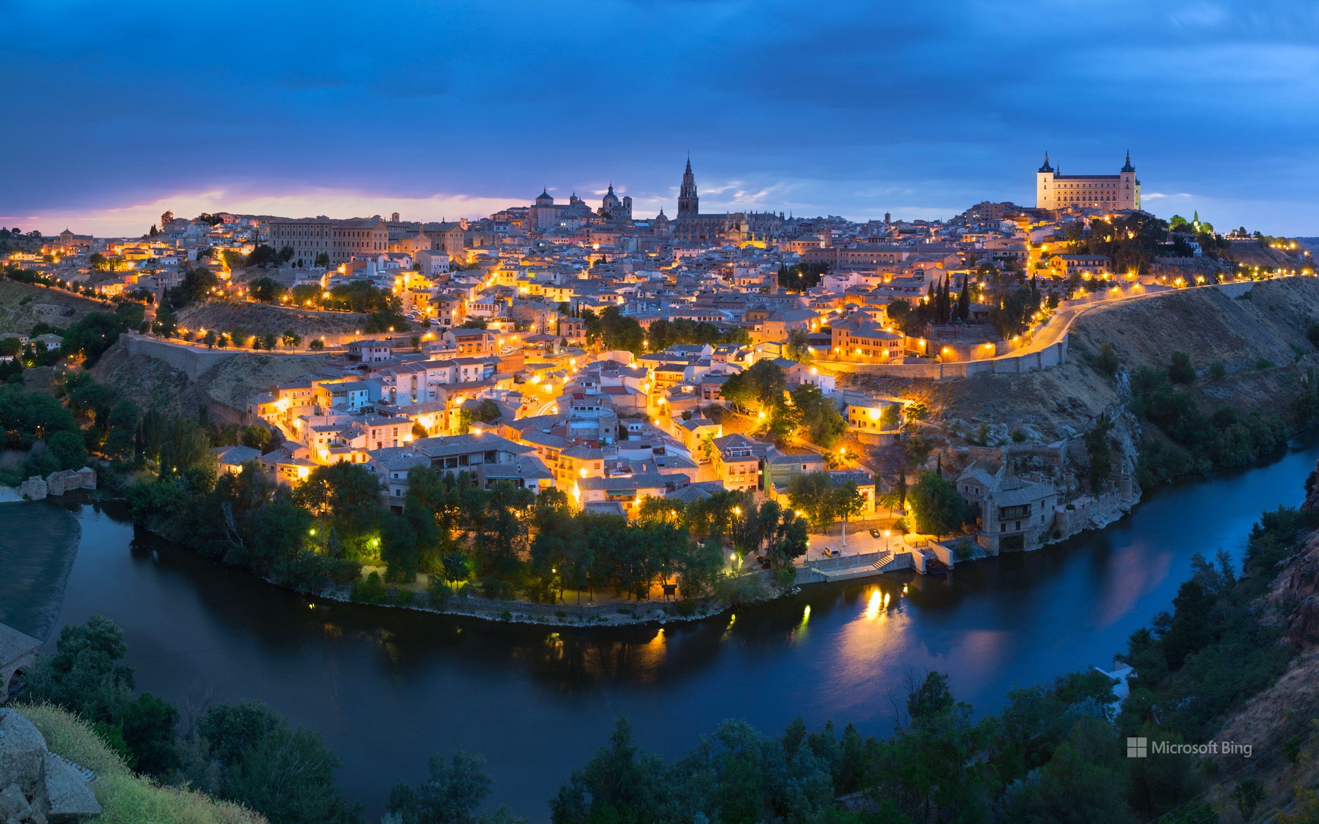 Panoramic view of the city of Toledo after sunset, Spain